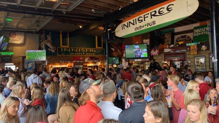 A packed gameday crowd of Alabama fans inside Innisfree Irish Pub in Tuscaloosa
